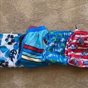 4 pair of swimming trunks